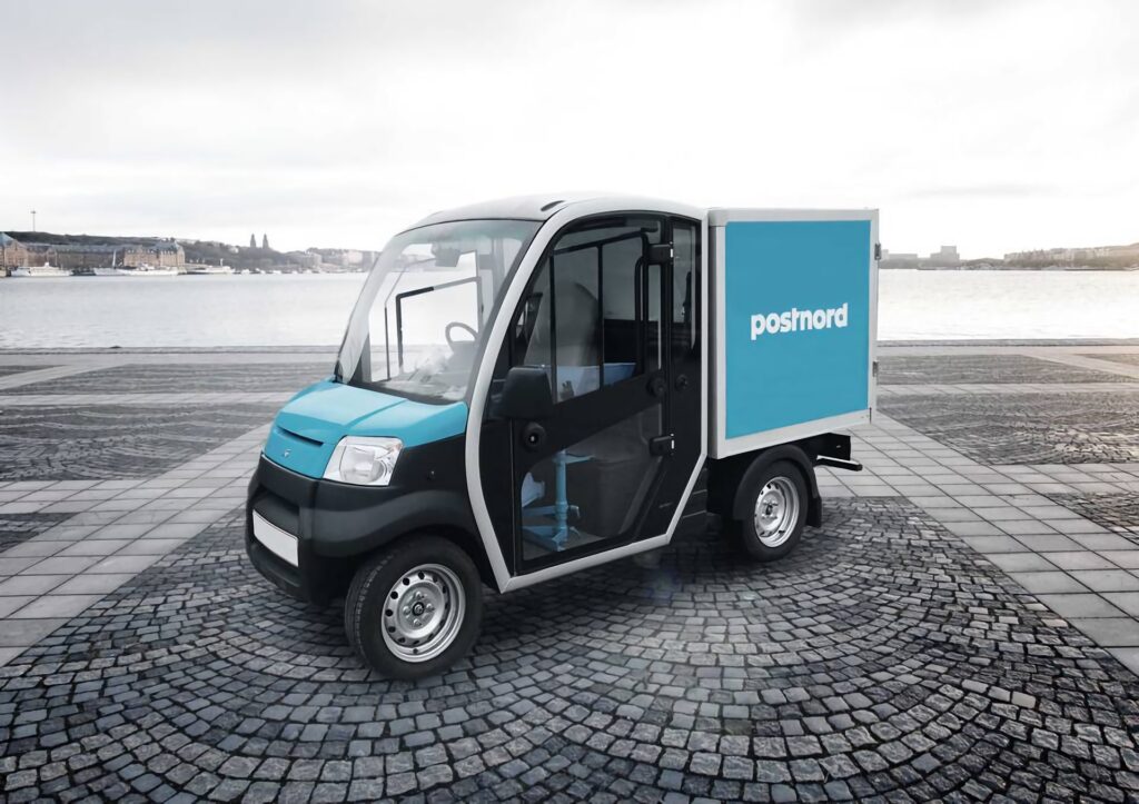 garia postnord car by the water