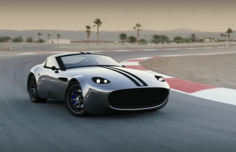 VTR 115 carone custom sports car on race track with palms in the background